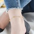 Elegante tobillera de acero de titanio oro rosa con cuentas doradas y cadena - Dorado
