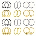 Macro shot of 24pcs stainless steel nose ring set in gold, silver, and black finish - Steel And Gold Combination