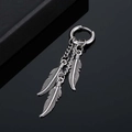 Minimalist stainless steel hoop earrings with double hanging feather pendants in silver finish - Steel Color Feather