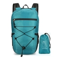 Foldable waterproof hiking backpack in lake blue with a compact storage pouch - 15L / Malachite green