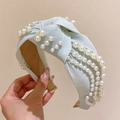Minzgrüner geknoteter Perlenhaarreif mit weißen Perlen für einen retro-eleganten Look - Hellgrün