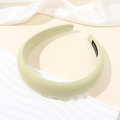 Light green padded headband in fabric with handmade label on beige aesthetic background - Light Green
