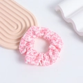 Pink leopard print fabric scrunchie with soft ruffled texture for cute hairstyles - Leopard Print Style