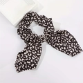 Elegante elastico per capelli con stampa leopardata bianco e nero e fiocco - Maculato nero