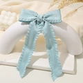 Elegant light blue satin bow hair clip with ruffled edges on a minimalist display - Lh240315-7k