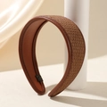 Geflochtenes braunes Stirnband mit Kunstlederfutter für ein stilvolles Haar-Accessoire - Braun