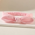 Pink elastic baby headband featuring a soft ribbed texture and decorative bow knot - Pink