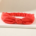 Bright red elastic bow headband for women featuring a soft ribbed texture and rabbit ear design - Watermelon red