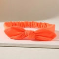 Elastic bright orange ribbed headband featuring a stylish rabbit ear bow decoration - Orange