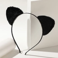 Serre-tête oreilles de chat en peluche noire pour fêtes et cosplay sur socle blanc - Oreilles de Chat Noir