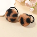 Pair of plush leopard print faux fur scrunchies with elastic black rubber bands - Orange