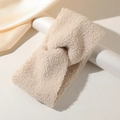 Beige plush criss-cross headband in soft teddy fleece for warm winter styling - Beige