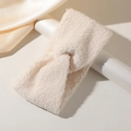 Creamy white plush faux fur cross headband with soft teddy texture for women - Off White