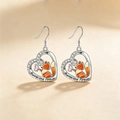 Detail of silver heart earrings with fox motif and 'Always and Forever' engraving - Earrings