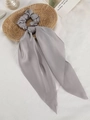 Silver grey satin bow hair tie with long ribbons on rustic woven background - Light Gray
