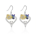 Boucles d'oreilles cœur argenté avec tournesol et papillon violet brillant - Boucles d'oreilles
