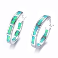 Silver hoop earrings with inlaid rectangular blue fire opal stones on a white background - Green