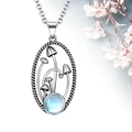 Silver celestial mushroom forest necklace featuring a round light blue moonstone pendant - Oval Mushroom Necklace