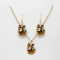 Detail view of cartoon reindeer jewelry set with gold necklace and matching drop earrings - Cute Reindeer White