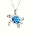 Macro shot of silver turtle pendant with vibrant blue opal inlay and detailed textures - Chain Only / Blue