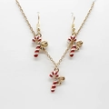 Detail of candy cane jewelry set with red and white enamel and golden bow design - Candy Cane 1