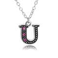 Silver necklace with letter U pendant featuring pink rhinestones on a white background - Letter U