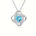 Elegant heart necklace with light blue gemstone and shimmering cubic zirconia accents - December - Sea Blue