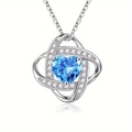 Elegant silver heart necklace with blue gemstone pendant and shimmering crystal frame - March-Light Blue