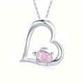 Ocean style heart necklace featuring a pink opal sea turtle pendant on a silver chain - Pink