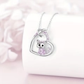 Detailed close-up of a heart-shaped cat pendant necklace with pink and white crystals - Silver