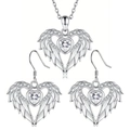Detailed view of silver heart jewelry set with angel wings and sparkling zircon stones - Necklace and Earrings Set / Silver