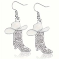 Detail view of silver western boot earrings with rhinestones and white enamel cowboy hat - White