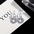Elegant geometric interlocking circle drop earrings featuring sparkling zircon pavé finish - Silver