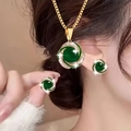 Elegant gold jewelry set with emerald green stones and zircon swirl earrings and necklace - Green (Set)