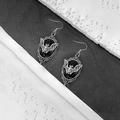 Detail of gothic silver-tone bat earrings with black stone inlay for Halloween outfits - Earrings / Black
