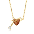 Makroaufnahme der goldenen Herz-Halskette mit Champagner-Edelstein und Schleife - 18K Goldfarbe (Champagner-Zirkonia)