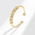 Anillo antiestrés de plata de ley 925 con siete cuentas doradas movibles - Ajustable / Dorado