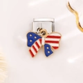 Macro view of Italian charm link featuring American flag enamel bow on stainless steel - Butterfly Style (1412)