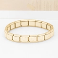 Dettaglio dei moduli per bracciale in acciaio dorato con incisione a forma di U - Lettera U