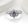 Macro detail of S925 sterling silver lotus ring with a pear-cut purple zircon gemstone - US 5 / Silver Tone (Purple Zirconia)