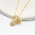 Macro view of gold plated bubble initial T pendant necklace with sparkling cubic zirconia - 925 Silver / Gold (Initial T)