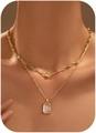 Close-up of layered gold necklace with emerald-cut crystal and paperclip chain - Transparent Rectangle Stone Style (Style 1)