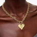 Golden chunky chain necklace with hammered heart pendant and toggle clasp on model - Hammered Heart Toggle Clasp (Style 4) / Gold