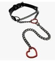 Detail of punk leather choker featuring gunmetal chains and two large red hollow hearts - Black Leather Red Heart (Style 1)