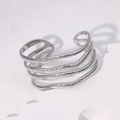 Silver multi-layer wave open bangle featuring textured hammer finish in stainless steel - Steel