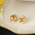Eleganti orecchini a lobo a nodo d'amore dorati con design in metallo lucido intrecciato - Oro