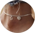 Silver ankle chain with CZ heart and letter G pendant worn with denim jeans - Silver-Letter G