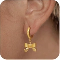 Close-up of gold bow pendant earrings with twisted hoop design on person ear - Rope Texture Bowknot Hoop (Style Two) / Gold