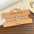 Zilveren roestvrijstalen armbanden met zon en maan hangers op een modieuze sieradenkaart - Zon Maan Platte Ketting Armband 2-delige Set (4861)
