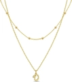 Double-layered gold beaded necklace featuring an elegant script letter O pendant - Letter O
